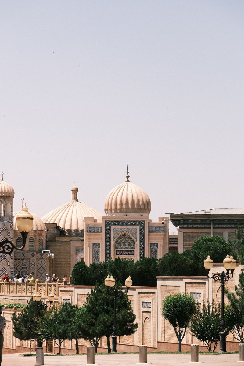 Modern buildings and gardens in Tashkent at dusk