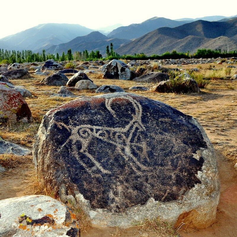 tour to cholpon-ata rock paintings in kyrgyzstan