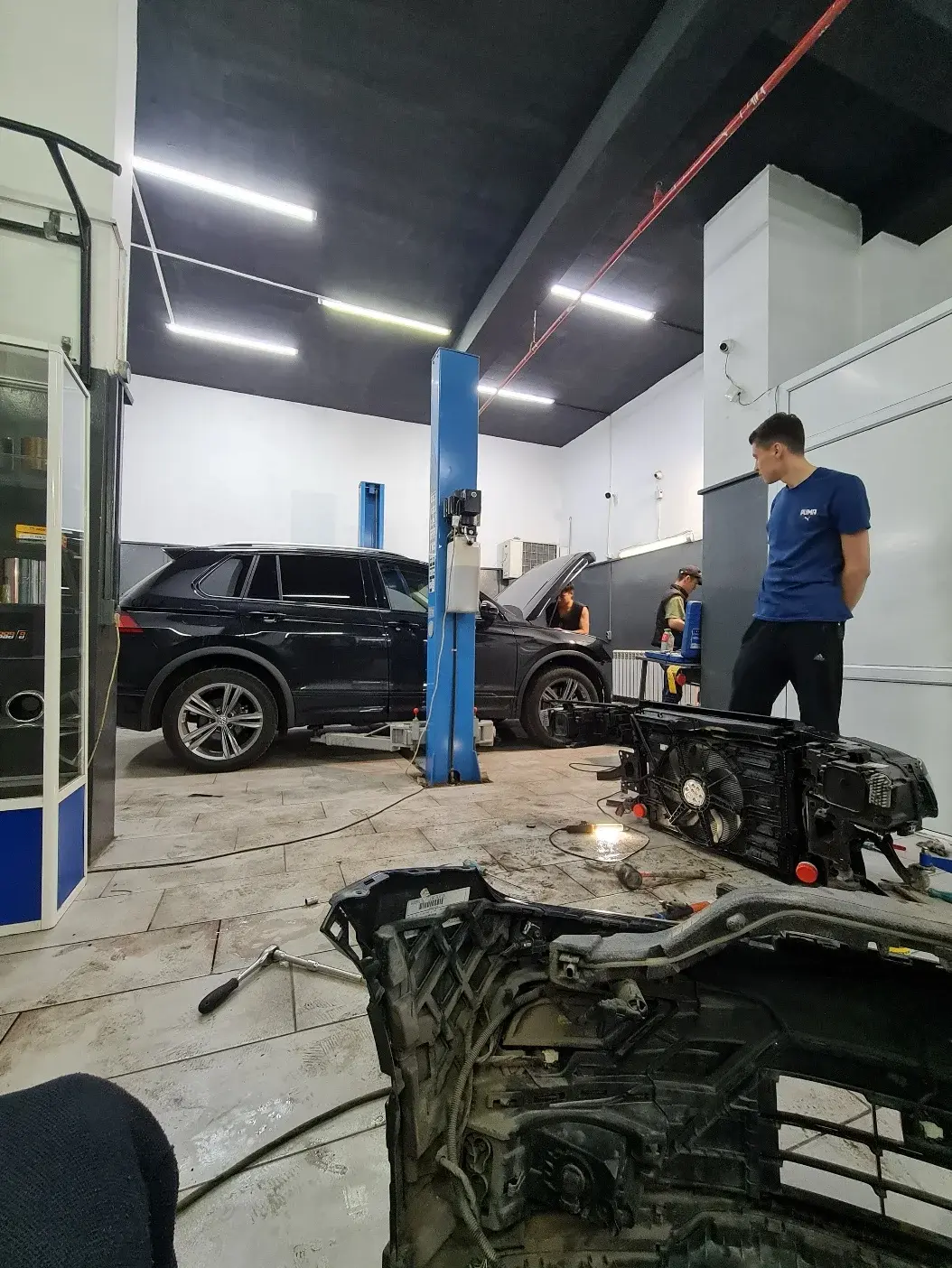 Зона приёмки и диагностики в мастерской ECOCAT в Астане