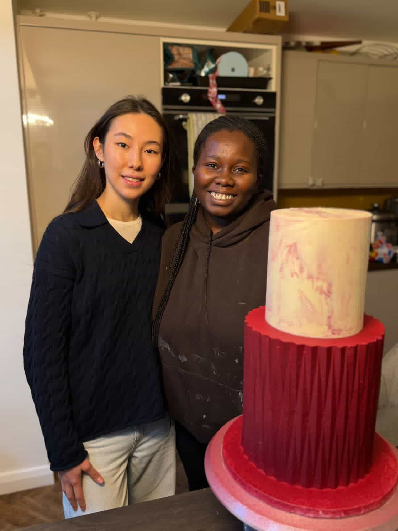 Student with their cake after the 1:1 class