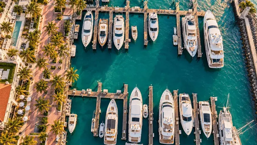 Miami marina from above: yachts in their slips where the food is delivered